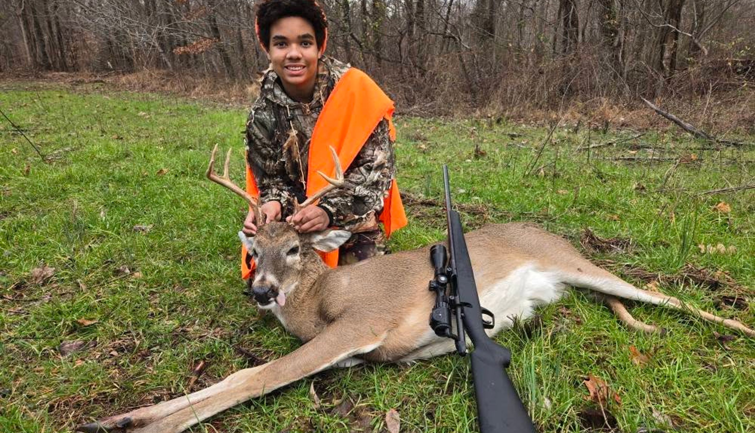 young boy thankful for his hunting trip
