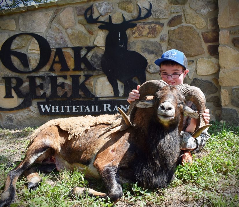 young boy happy to hunt